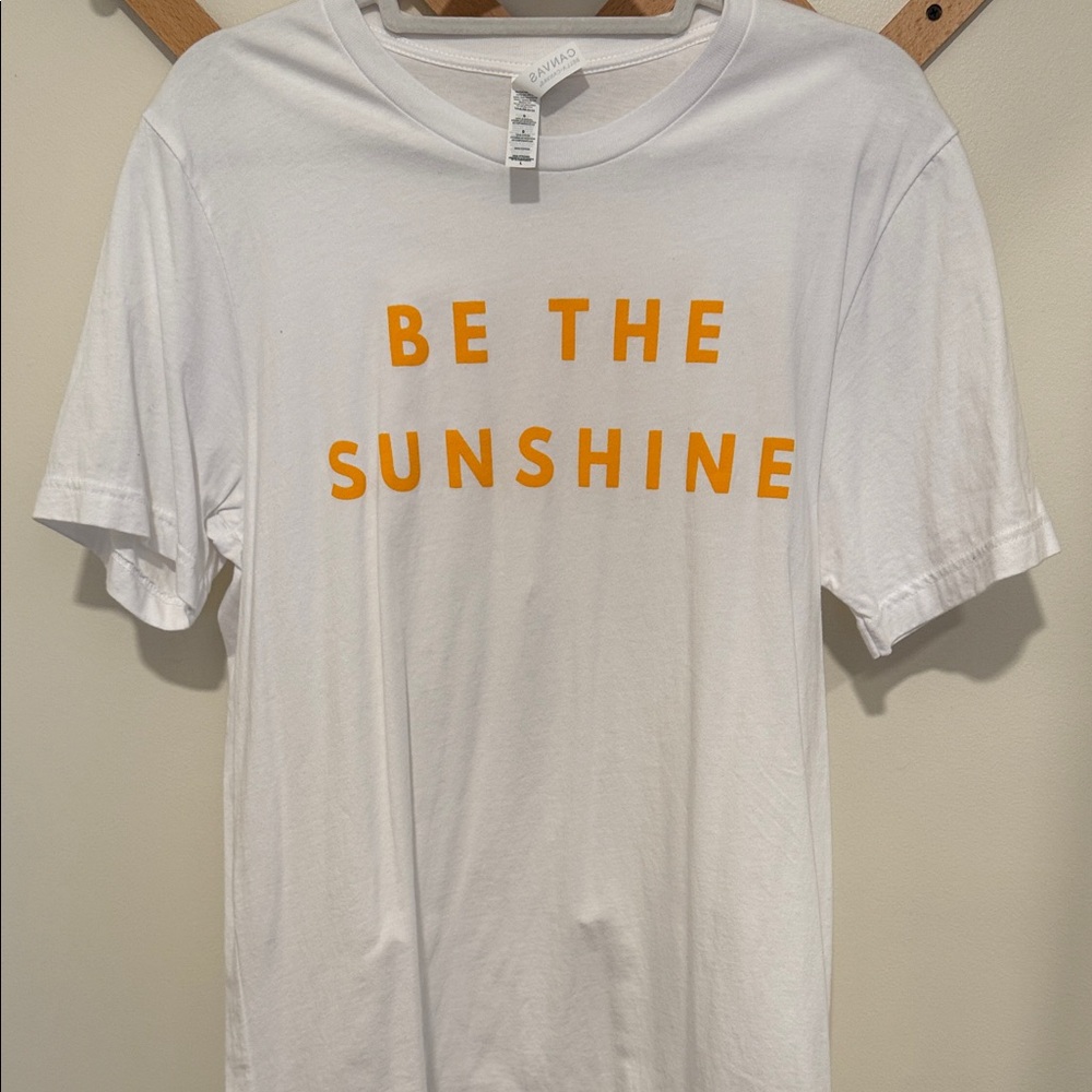 White T-Shirt with Orange Text
